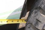 Less than 1.5" tire clearance on the outside rear