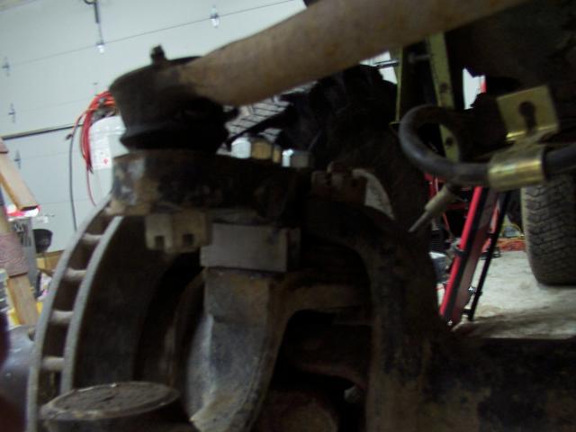 Parts Mike 1" High-steer arm spacer installed - hopefully this will prevent the new draglink from getting bent by the sprin