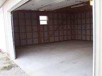 More to the south, the single 9x9 door opens to this workbay