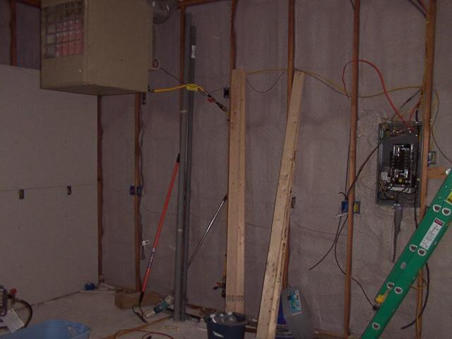 More wiring done on the North wall.  Not quite finished - the cable TV, phone, and ethernet need to be run before this wall can 