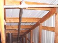 Also above the attic door, looking west, not quite visible in the previous picture.  This line slopes down and away to supply a 