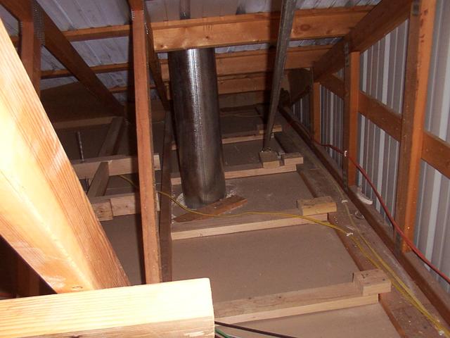 Also above the attic door, looking west, not quite visible in the previous picture.  This line slopes down and away to supply a 