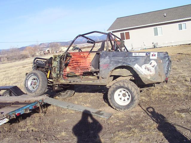 Drove the Scout outside to give it a bath - "ramping" on the car trailer to get access to the underside.