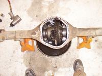 Rear diff draining, waiting for the bearing caps to come off and the carrier to come out.