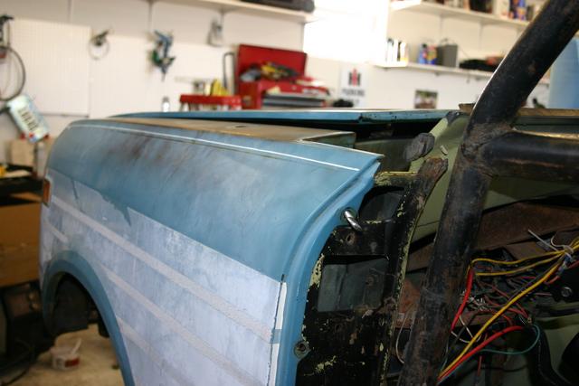 Another view of the hood needing to be propped open slightly.