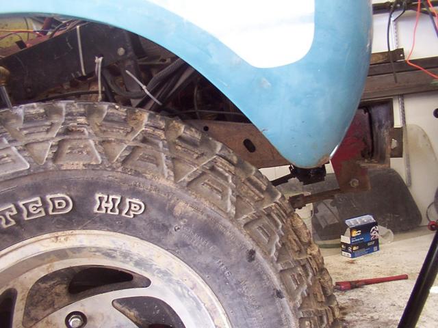 Now checking clearance at the front with the tire turned in.  I think I'll trim just a little.