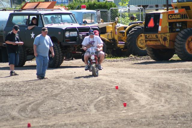John Fleck and Lau-ren do the divorce course on his motorcycle.
