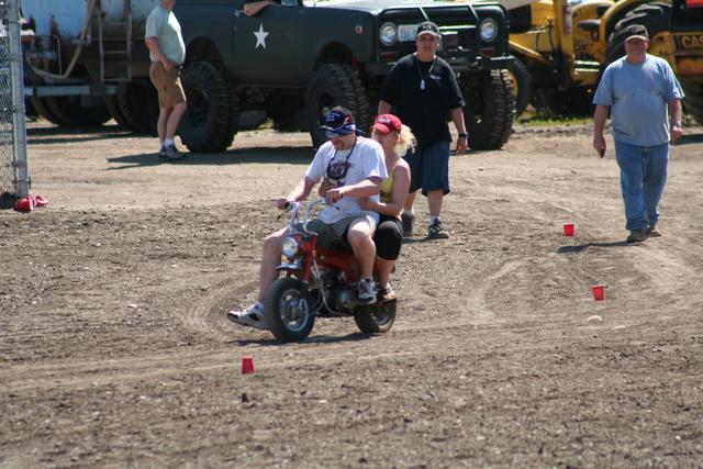John Fleck and Lau-ren do the divorce course on his motorcycle.