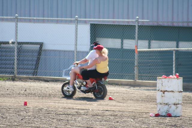 John Fleck and Lau-ren do the divorce course on his motorcycle.
