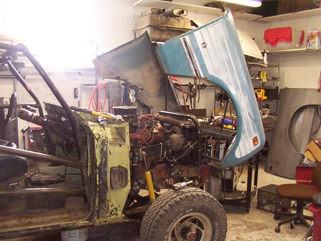 Making sure the tilting front clip works with the fenders bolted on.  It's a little difficult to open with the fenders wanting t
