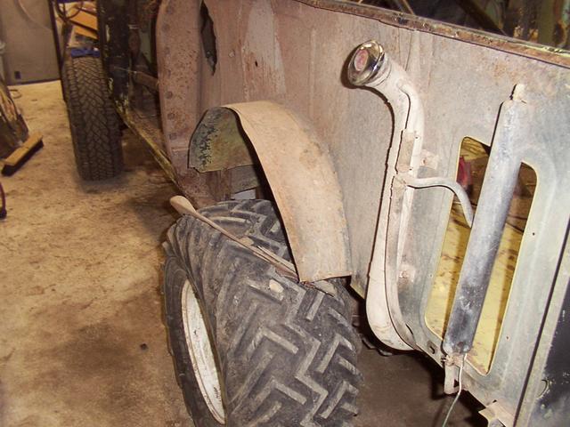 Driver's side after cutting the wheel well.