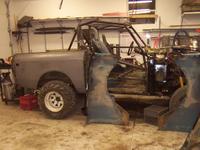 Passenger side done, both fenders trimmed and a few spots painted.