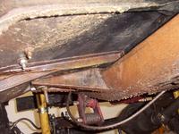 Driver's side body mount is pushing into the frame on the bottom
