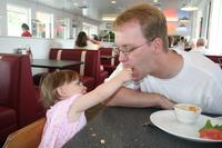 Lunch at the Moab Diner - Joleigh feeds Dad some of her left over grilled cheese