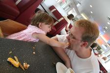 Lunch at the Moab Diner - Joleigh feeds Dad some of her left over grilled cheese