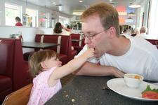 Lunch at the Moab Diner - Joleigh feeds Dad some of her left over grilled cheese