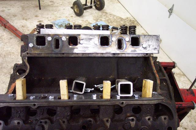 Both flanged bolted in place