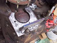 Test fit with the "L" welded in place.  I deviated from a direct factory duplicate by grinding the relief for the drai
