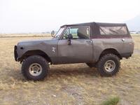 Tigger, 8/20/2003, sitting in the field next to the garage.  4" front/SOA rear, 36x12.50 TSLs